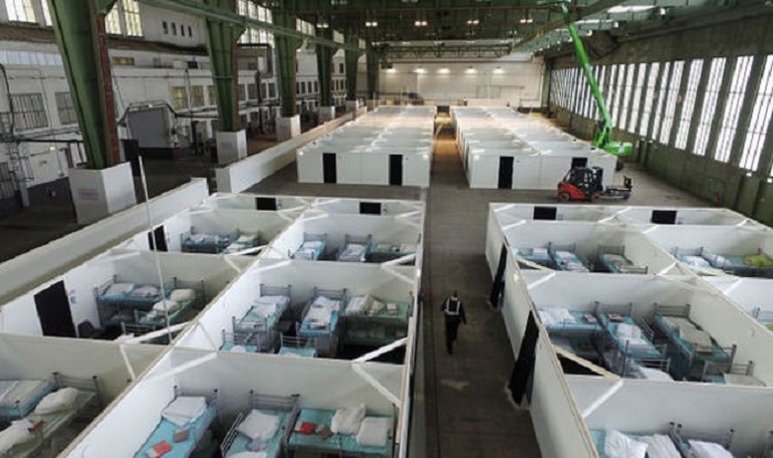 Berlin police raid Tempelhof airport refugee camp after Christmas market attack